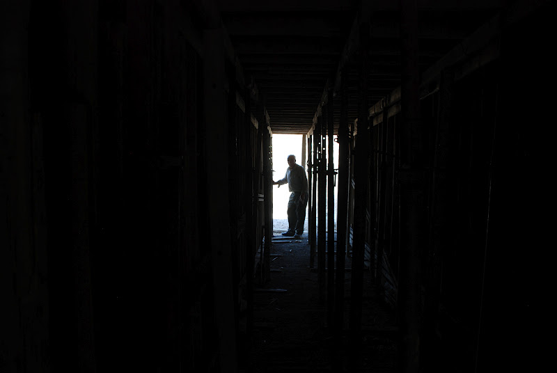 Abu Nidal standing at the end of the tunnel on the other side of his land