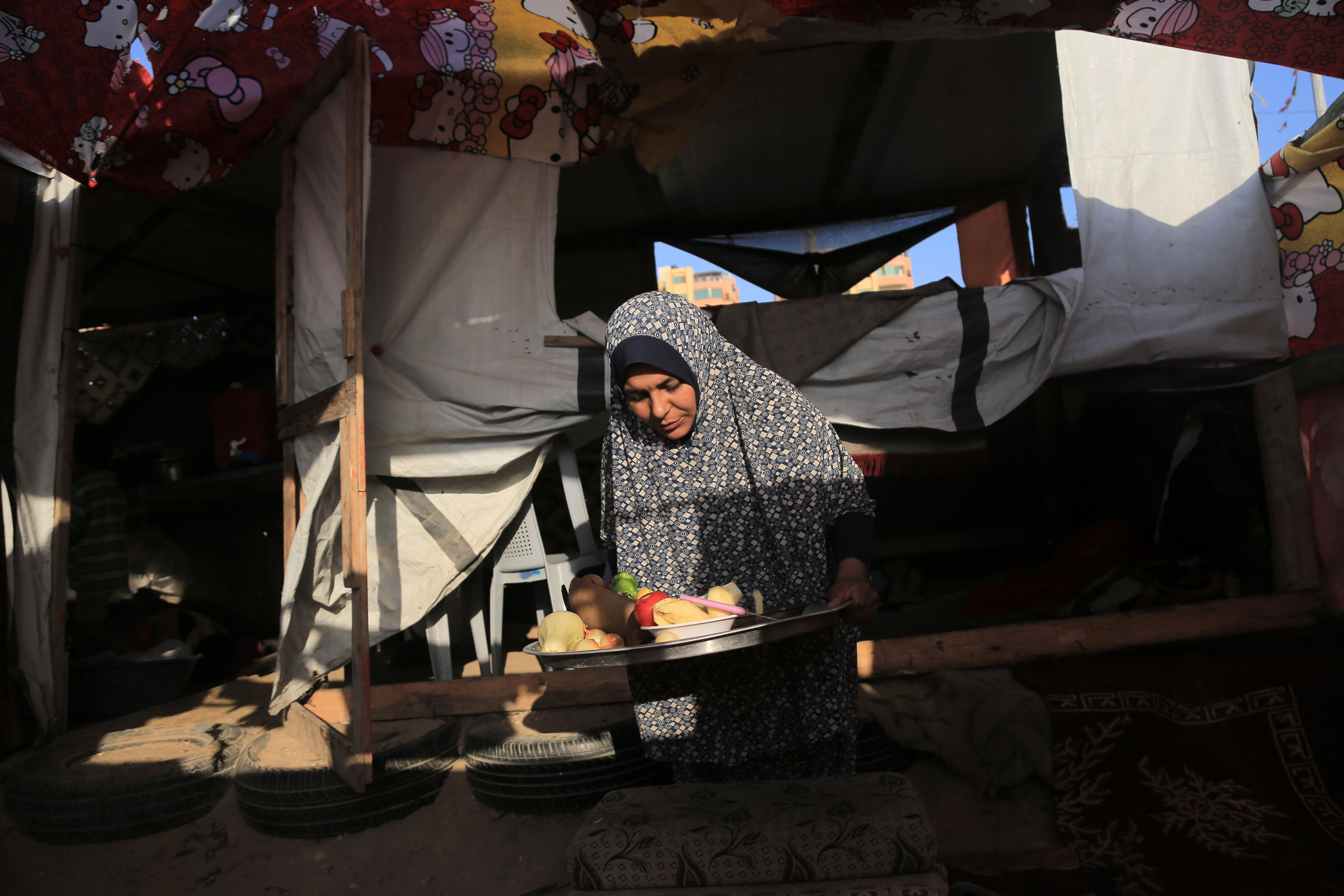 Onion, potato, apple and green peppers: key ingredients in the al-Lahham family’s iftar meal.