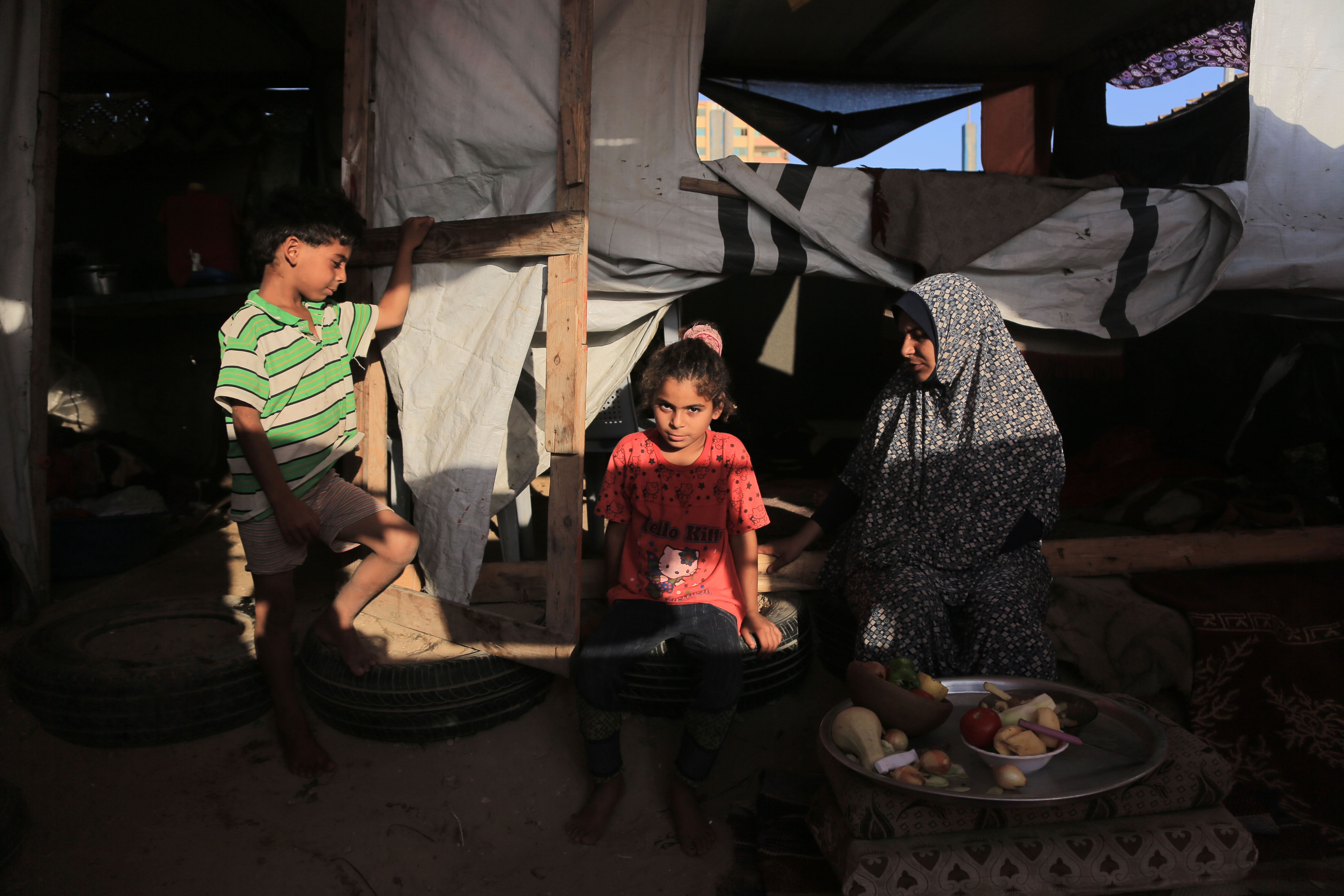 The late afternoon glow of the sun inside the tent is an indication that sunset—and the Ramadan iftar meal—are fast approaching.