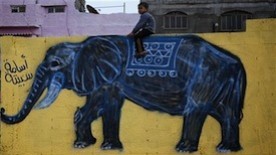 AP Photos: Painters Bring New Life to Hard-hit Areas in Gaza