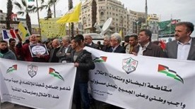 Hundreds protest across West Bank calling for boycott