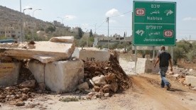 PHOTOS: Israeli Army Blocks Main Roads to Palestinian Villages