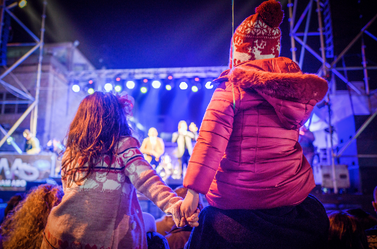 Girls watching the Christmas Tree Lighting Celebration, Nazareth