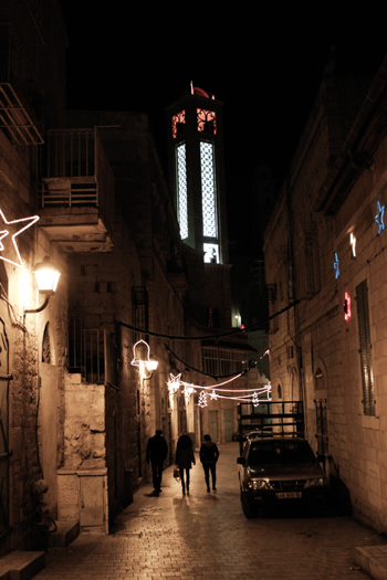 A street in Bethlehem with Christmas lights. (PHOTO: Firas Mukarker)